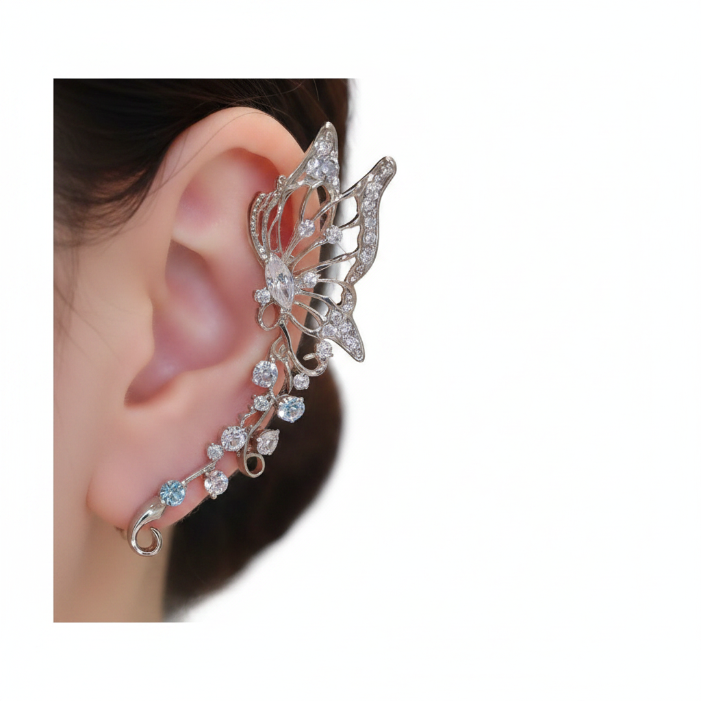 Crystal butterfly ear cuff on ear, white studio background