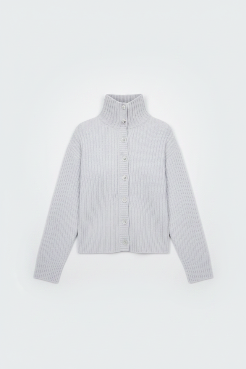 White ribbed turtleneck sweater flat lay on white background